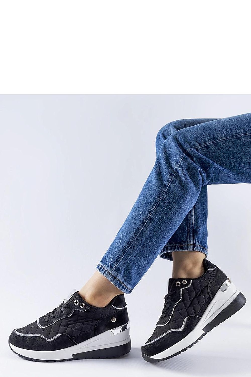 black lace sneakers detail view