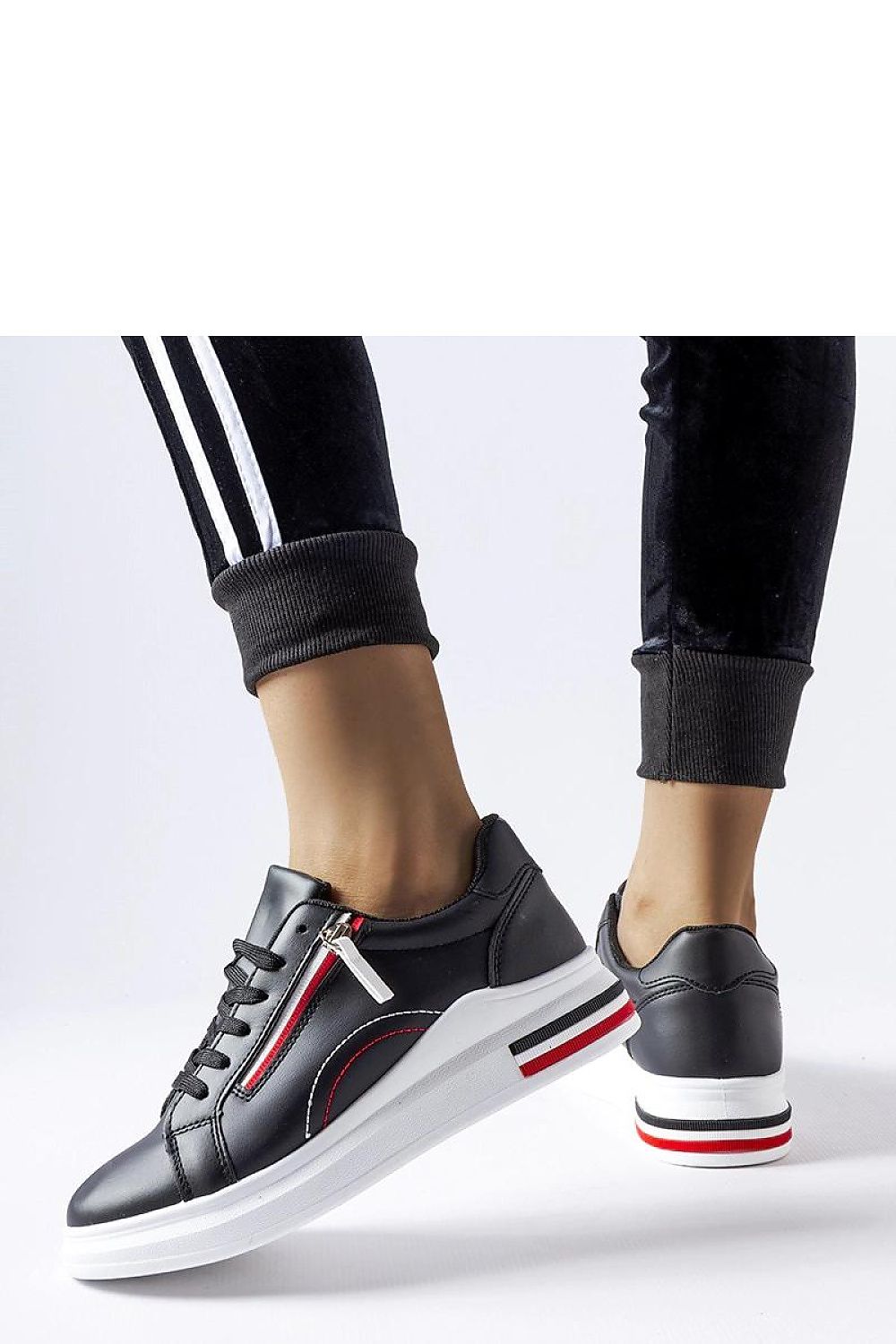 black lace sneakers detail view