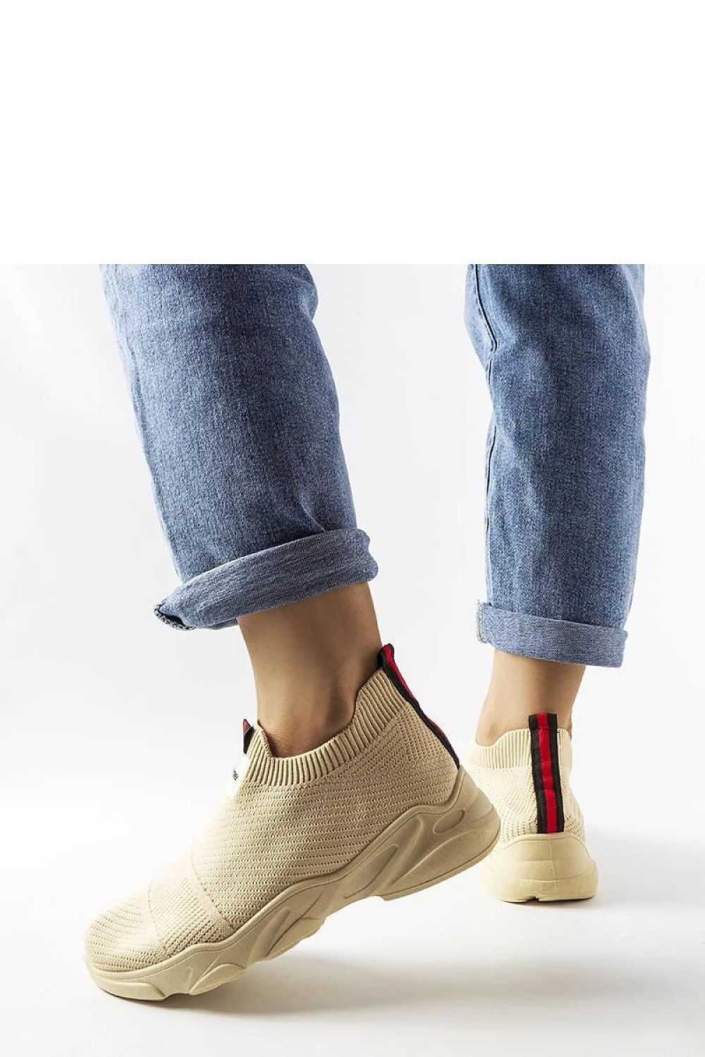 beige sport shoes detail view