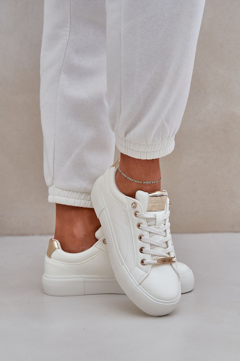 white sport shoes detail view