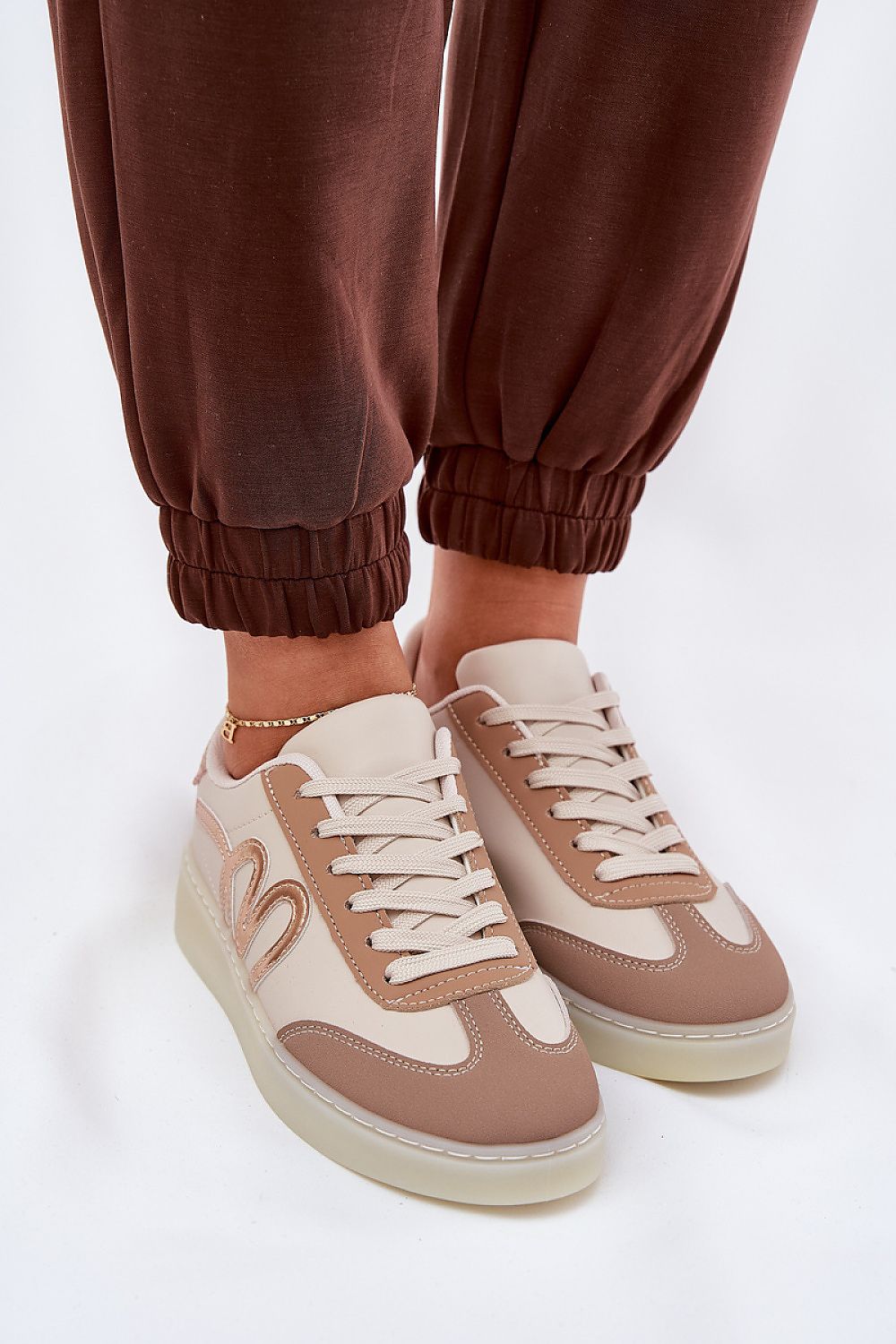 beige sport shoes view 6