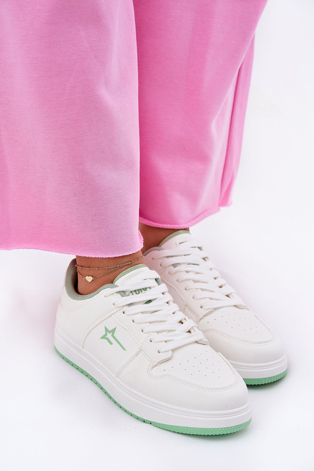 white sport shoes detail view