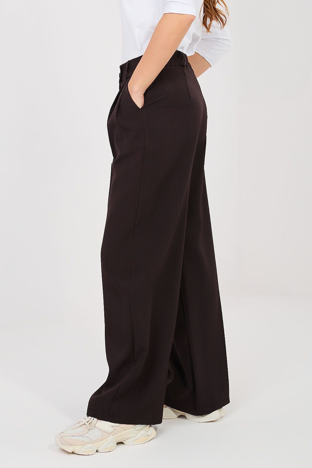 brown women trousers back view