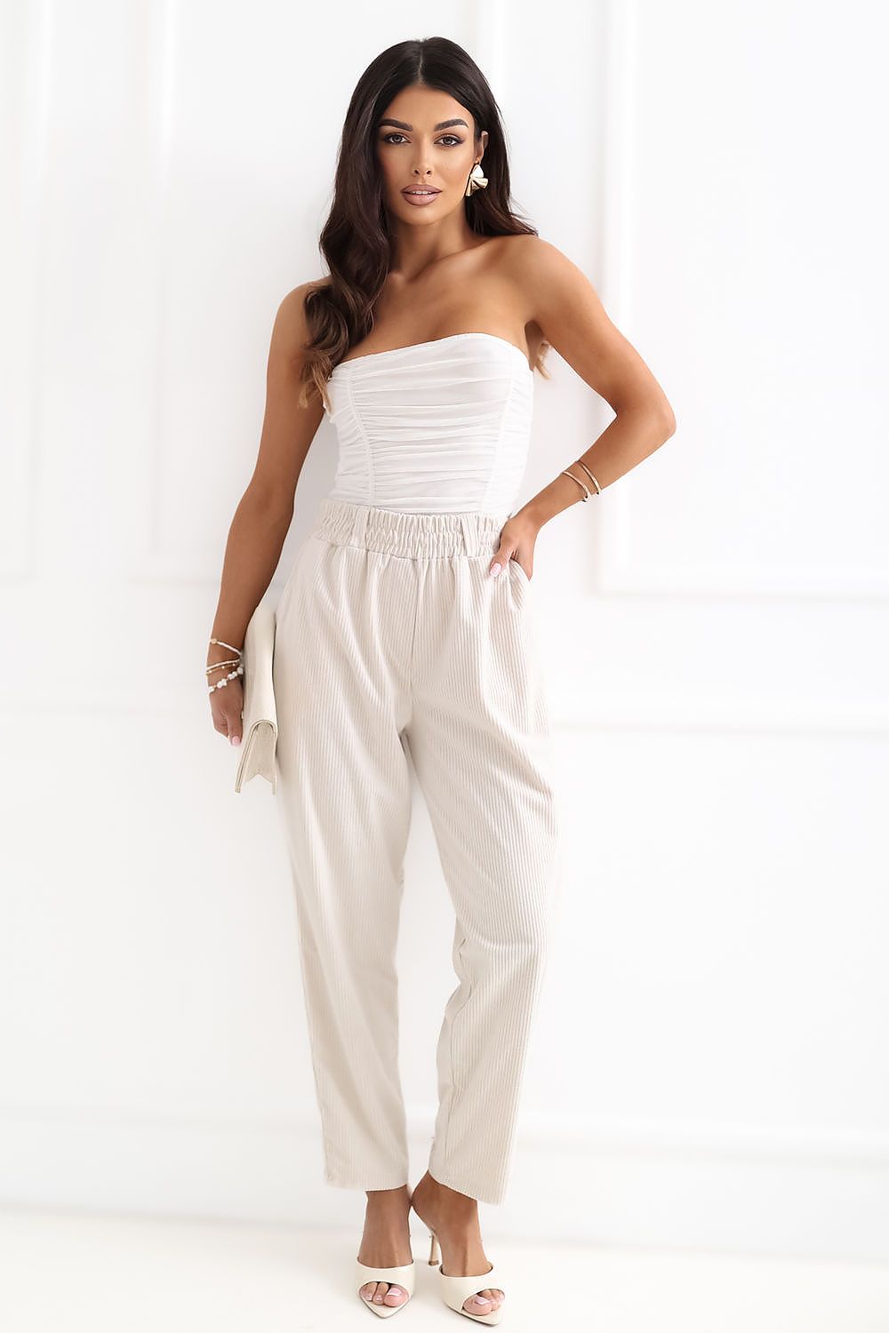 beige corduroy trousers back view