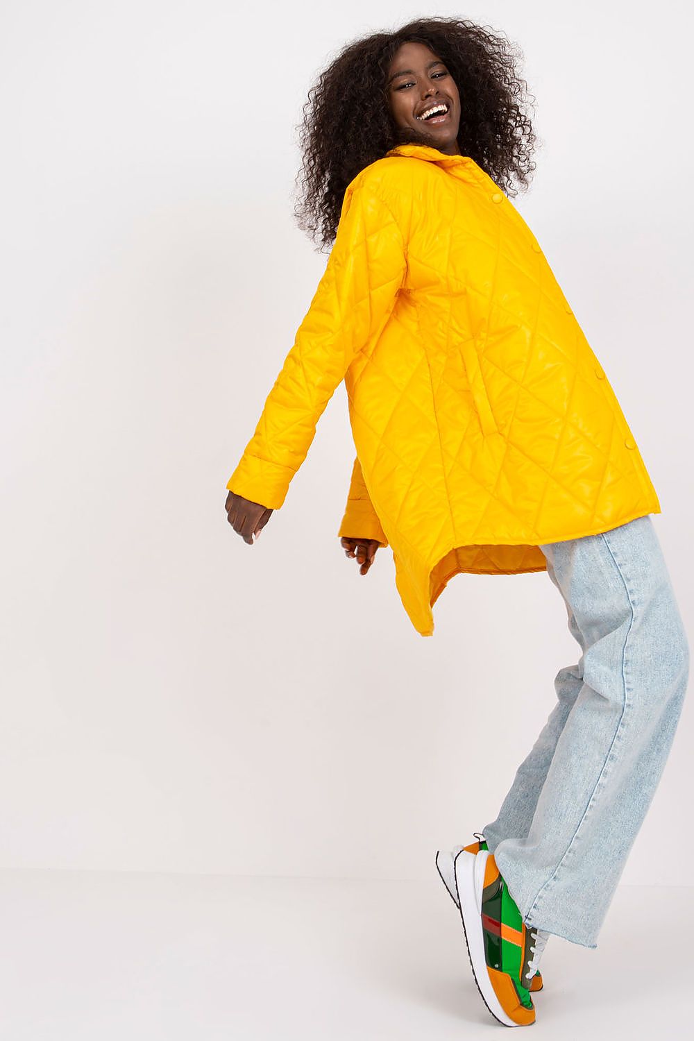 yellow long sleeve jacket detail view