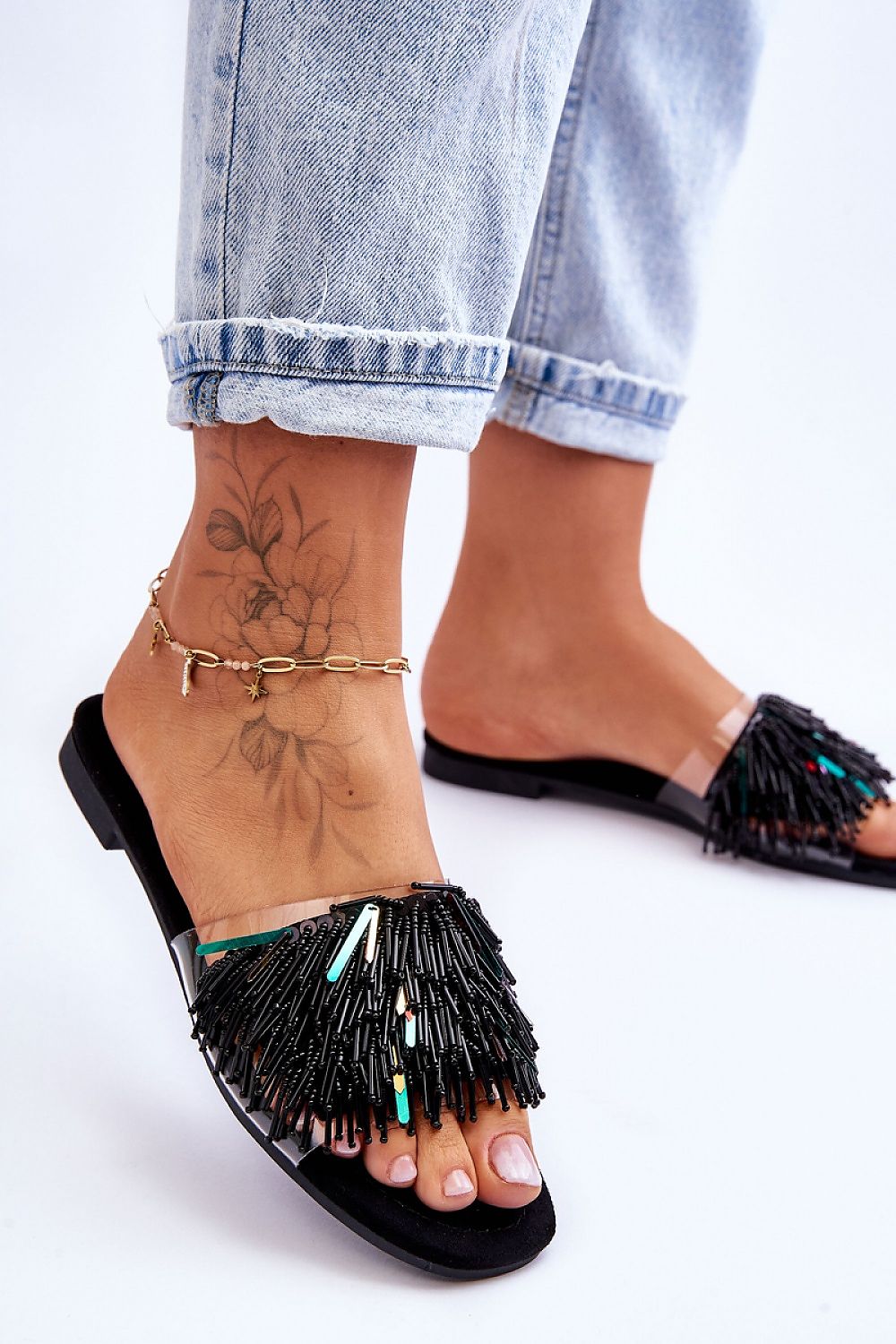 black flip-flops detail view