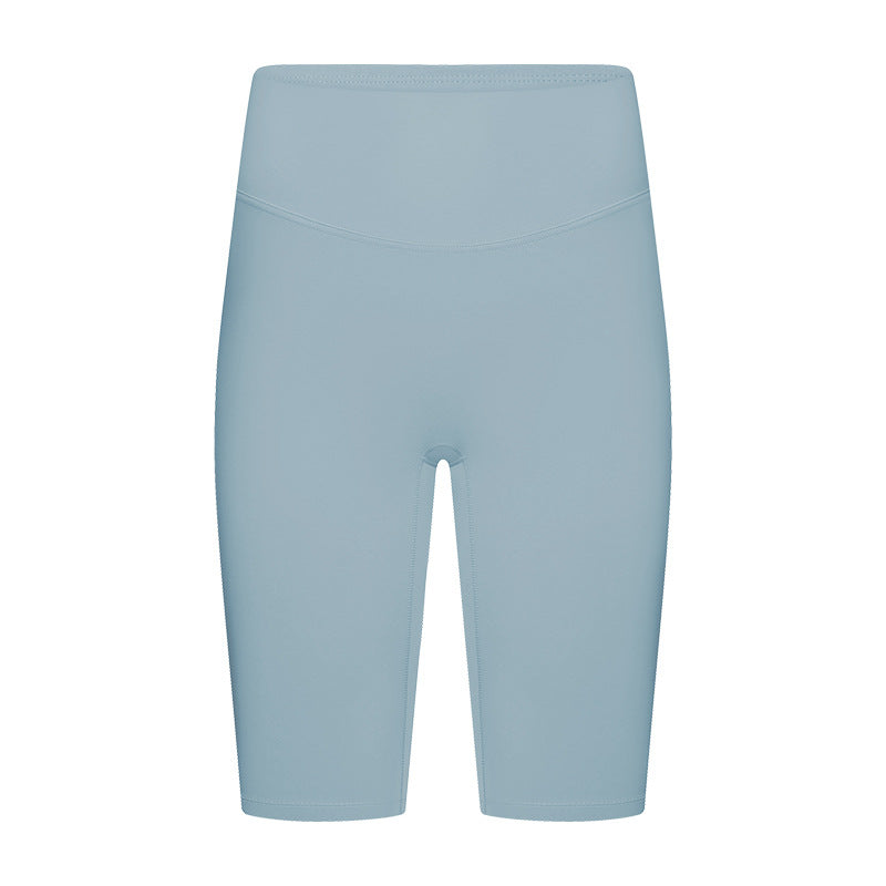 Front view of light blue yoga shorts on model