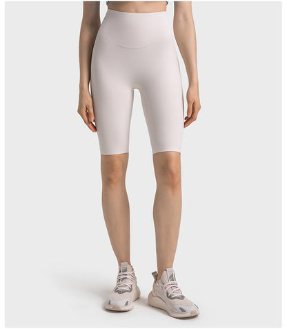 Front view of white high-waisted yoga pants on model