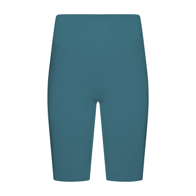 Model wearing light blue high-waisted yoga shorts