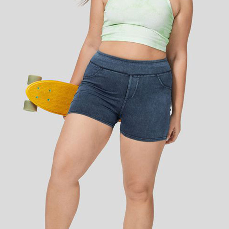 Plus size woman wearing high waist denim yoga shorts


