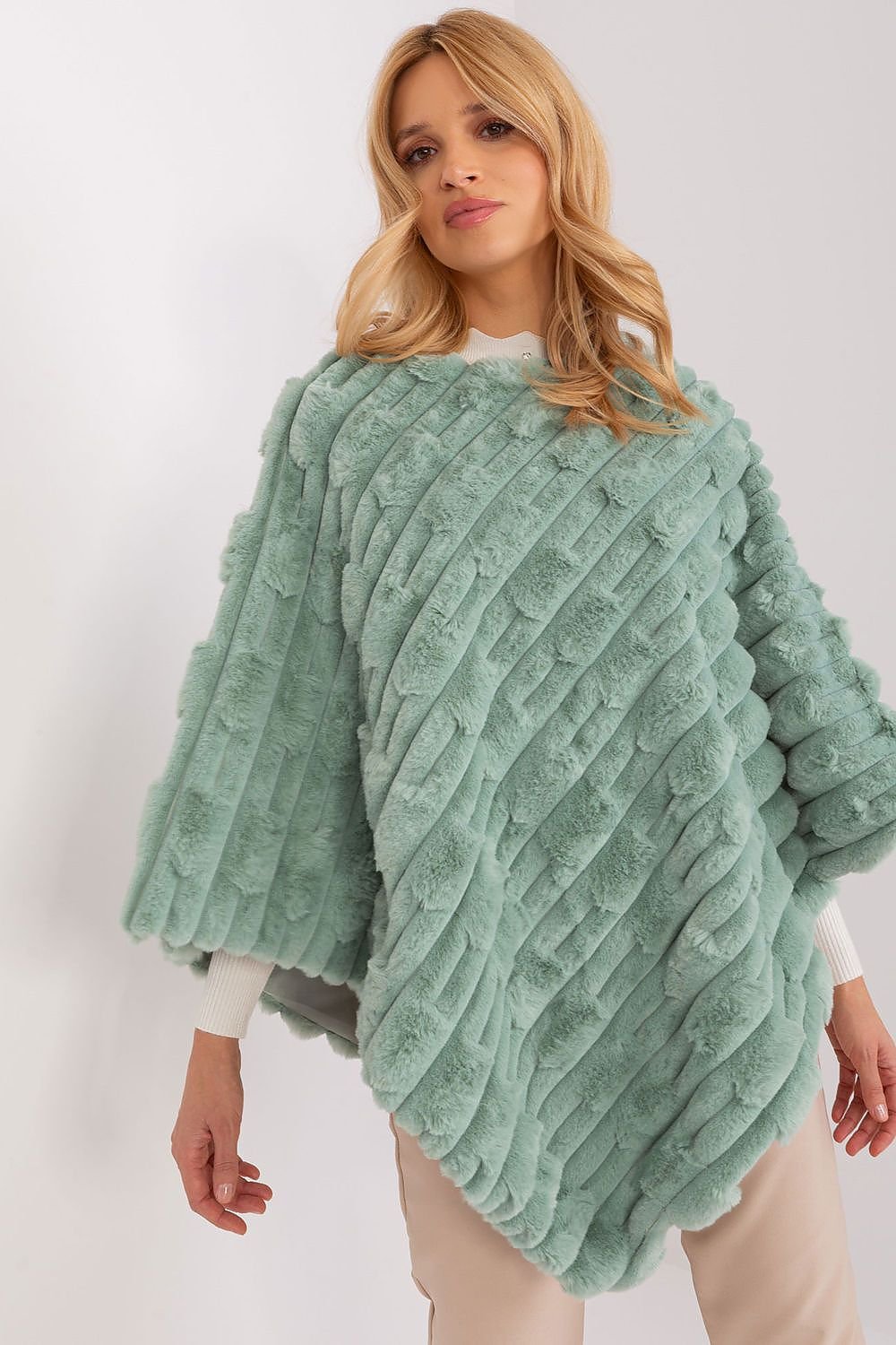 green poncho front view