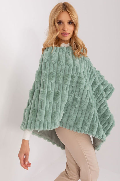 green poncho detail view