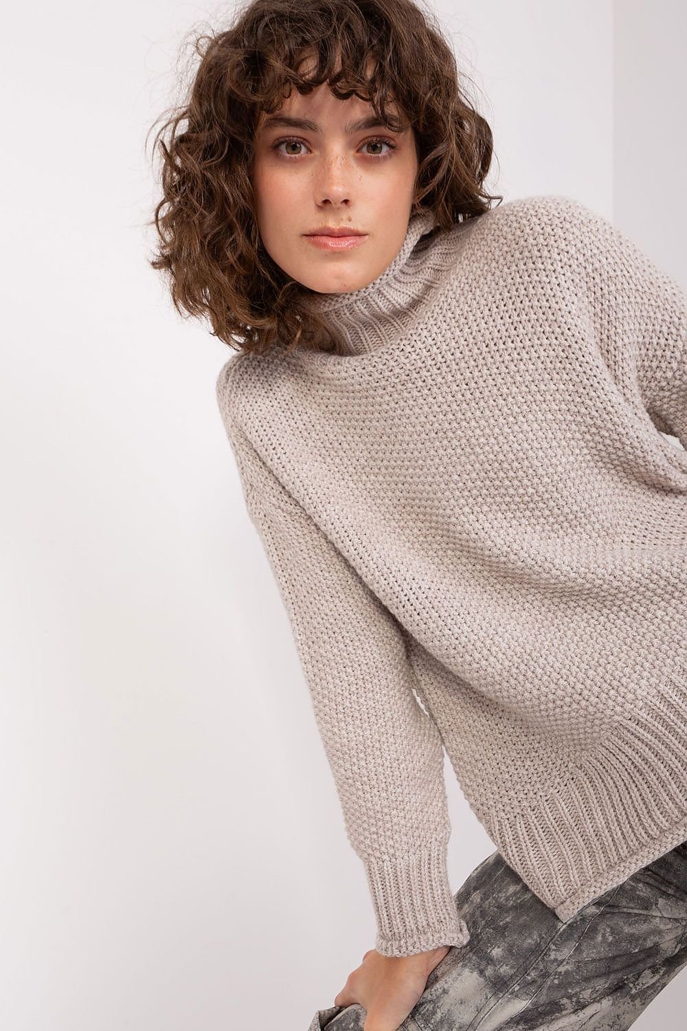 beige long sleeve turtleneck turtleneck back view