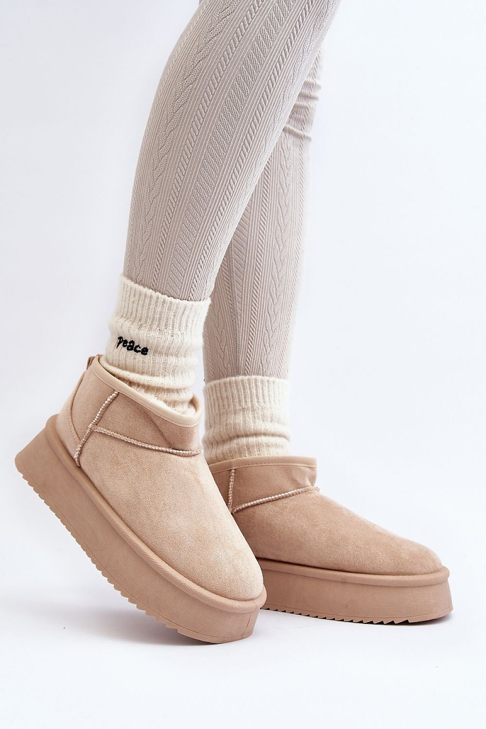 green snow boots back view