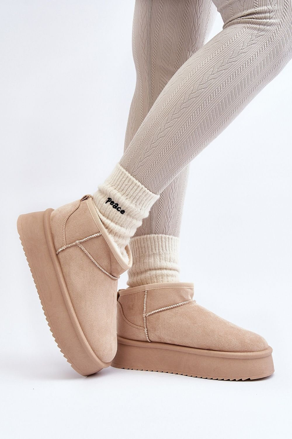 green snow boots side view