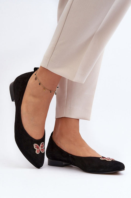 black ballet flats front view