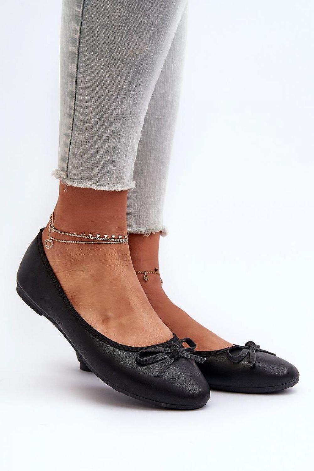 black ballet flats front view