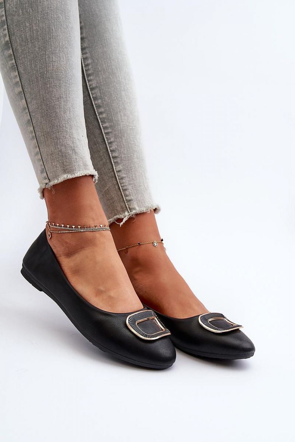 black ballet flats front view