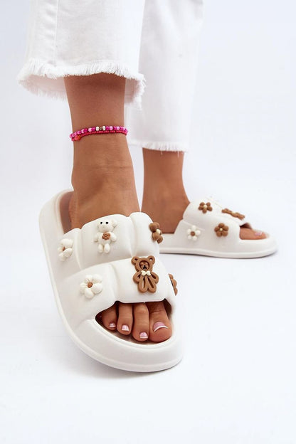 white flip-flops detail view