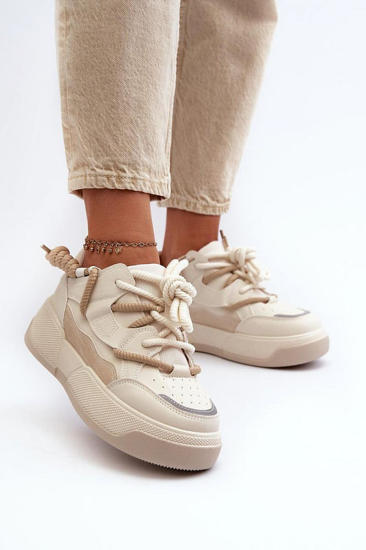 beige sport shoes front view