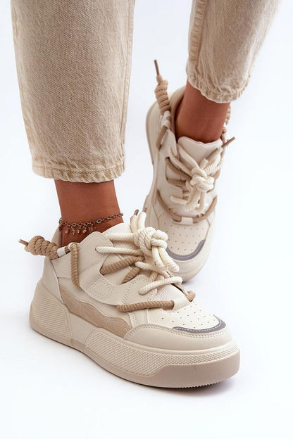 beige sport shoes detail view