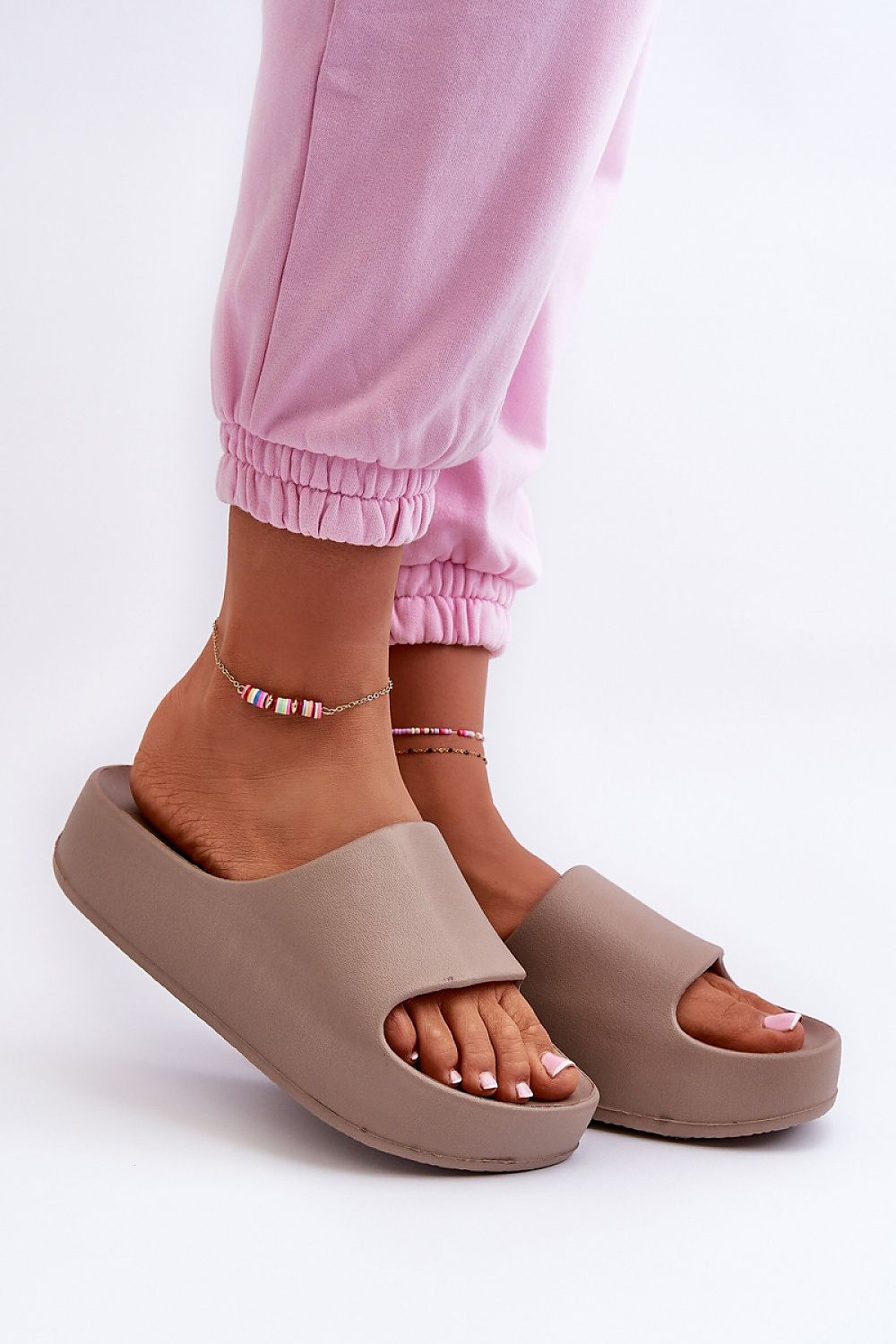 brown flip-flops front view