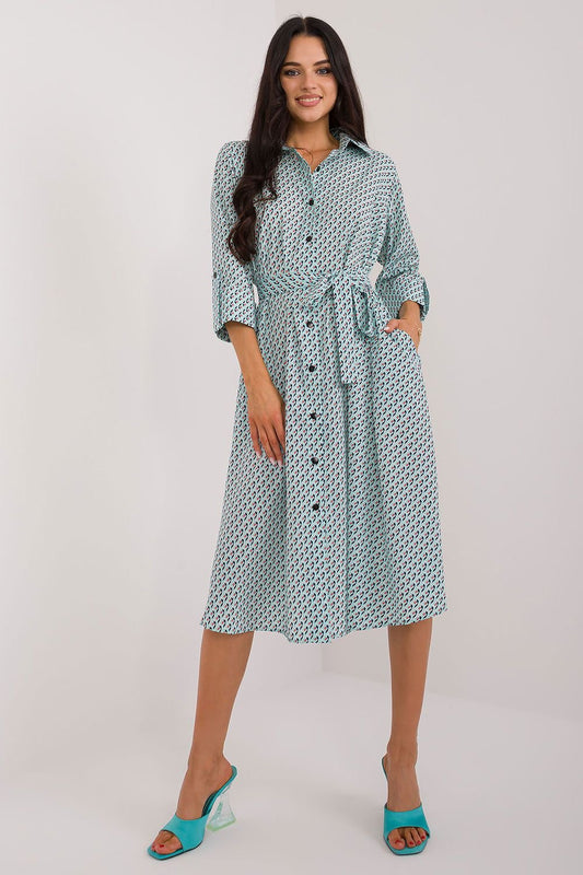 green flared belted day dress front view