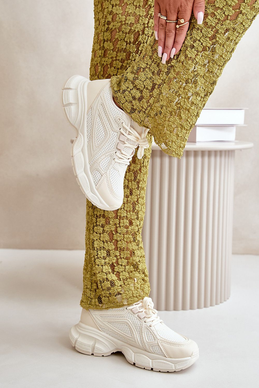 beige sport shoes detail view