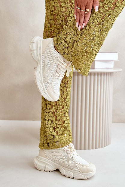 beige sport shoes detail view