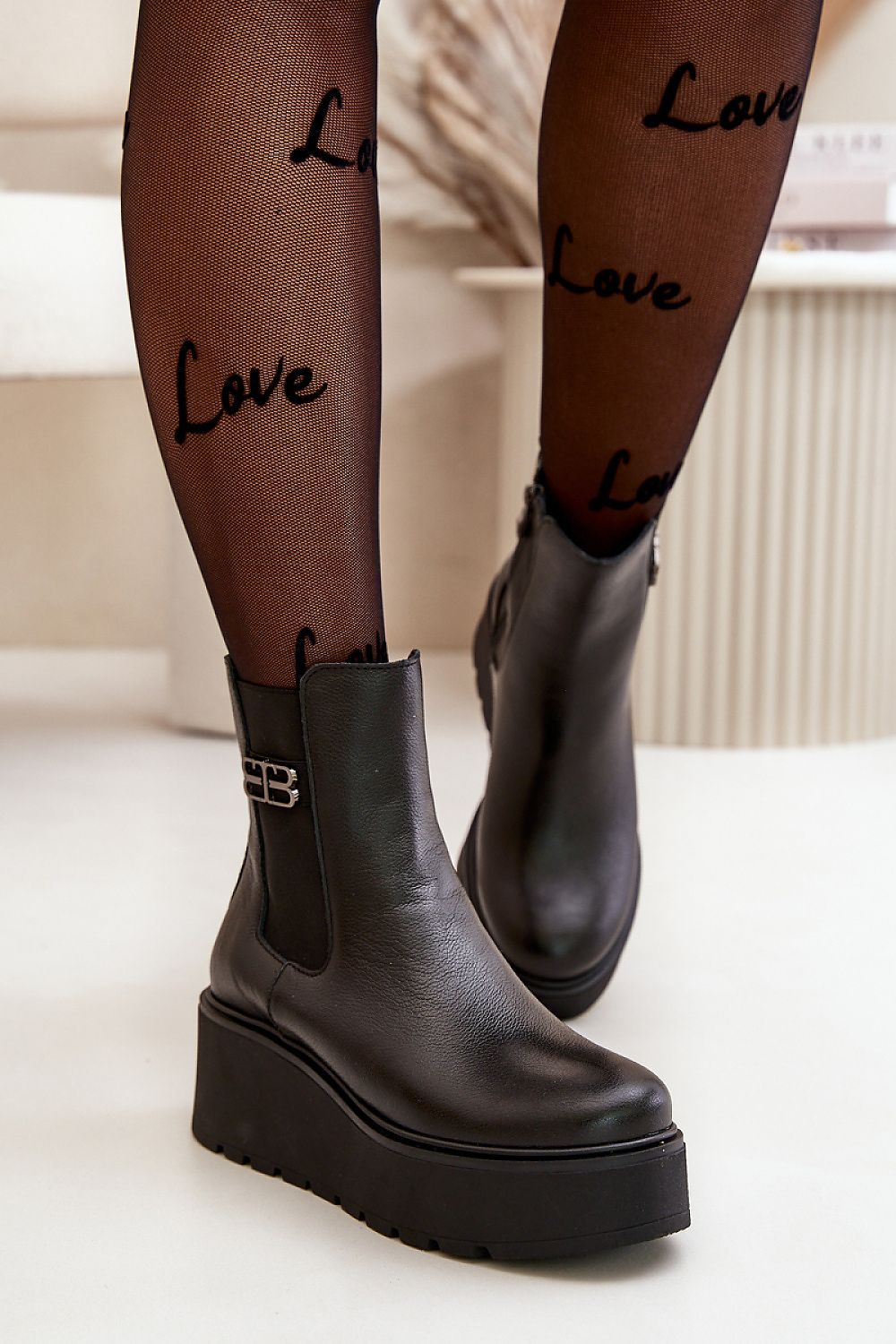 black buskin boots front view