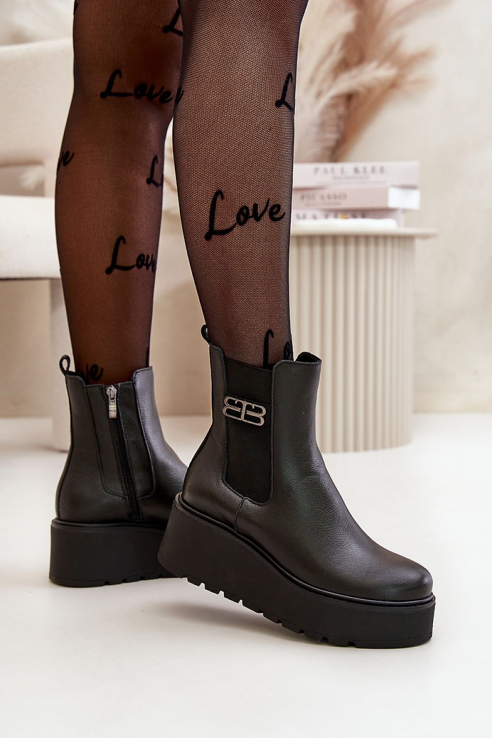 black buskin boots detail view