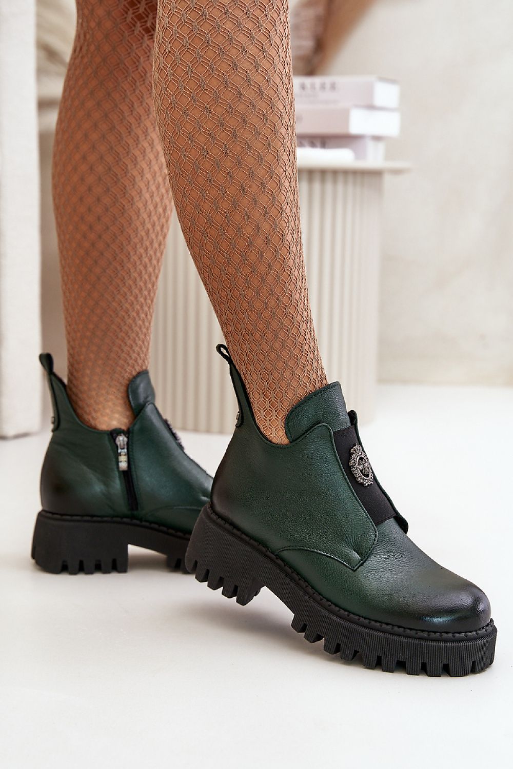 green boots front view