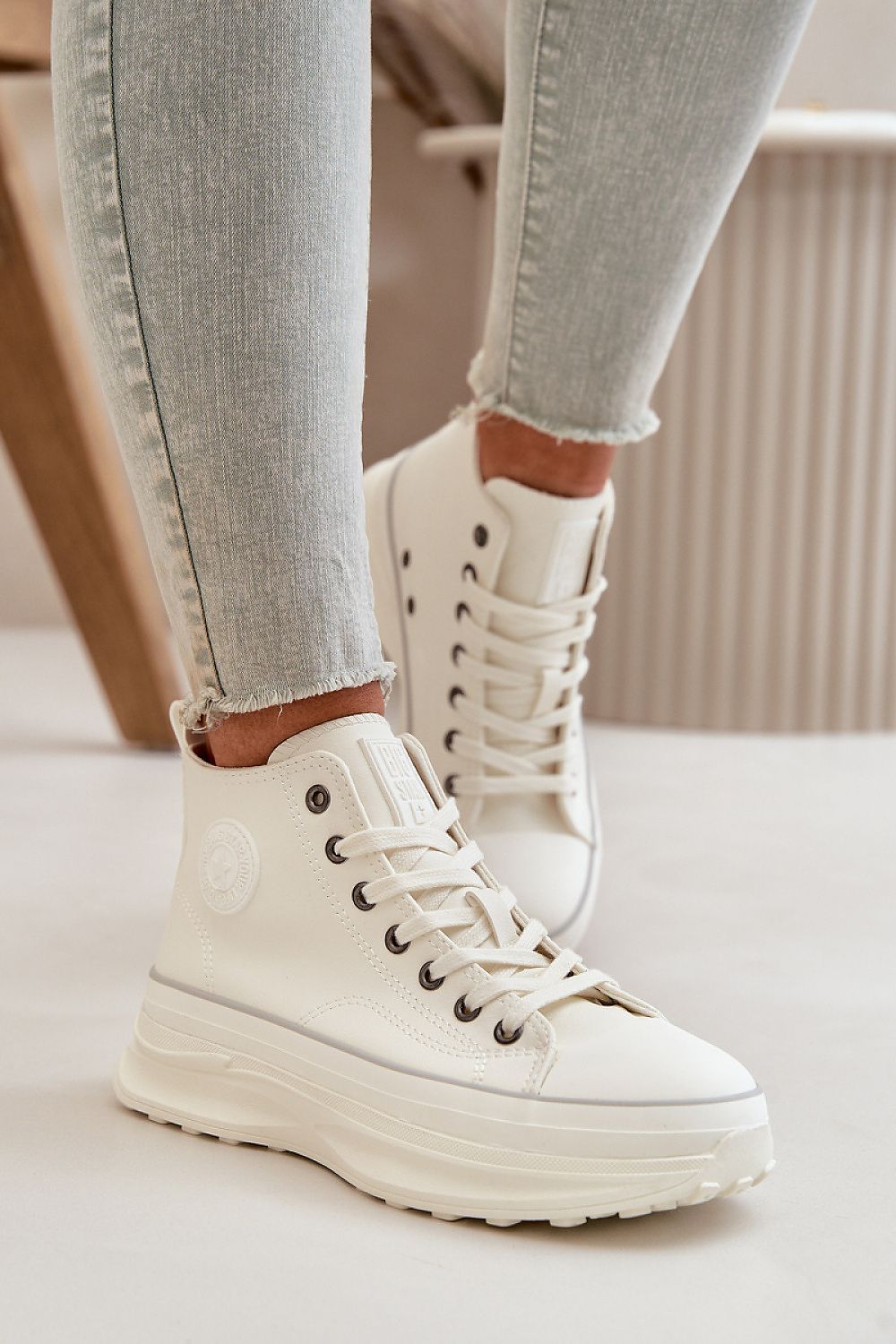 white sneakers front view