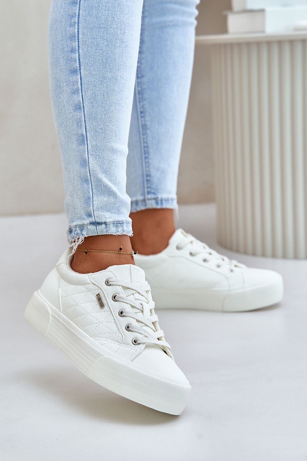 white sneakers front view