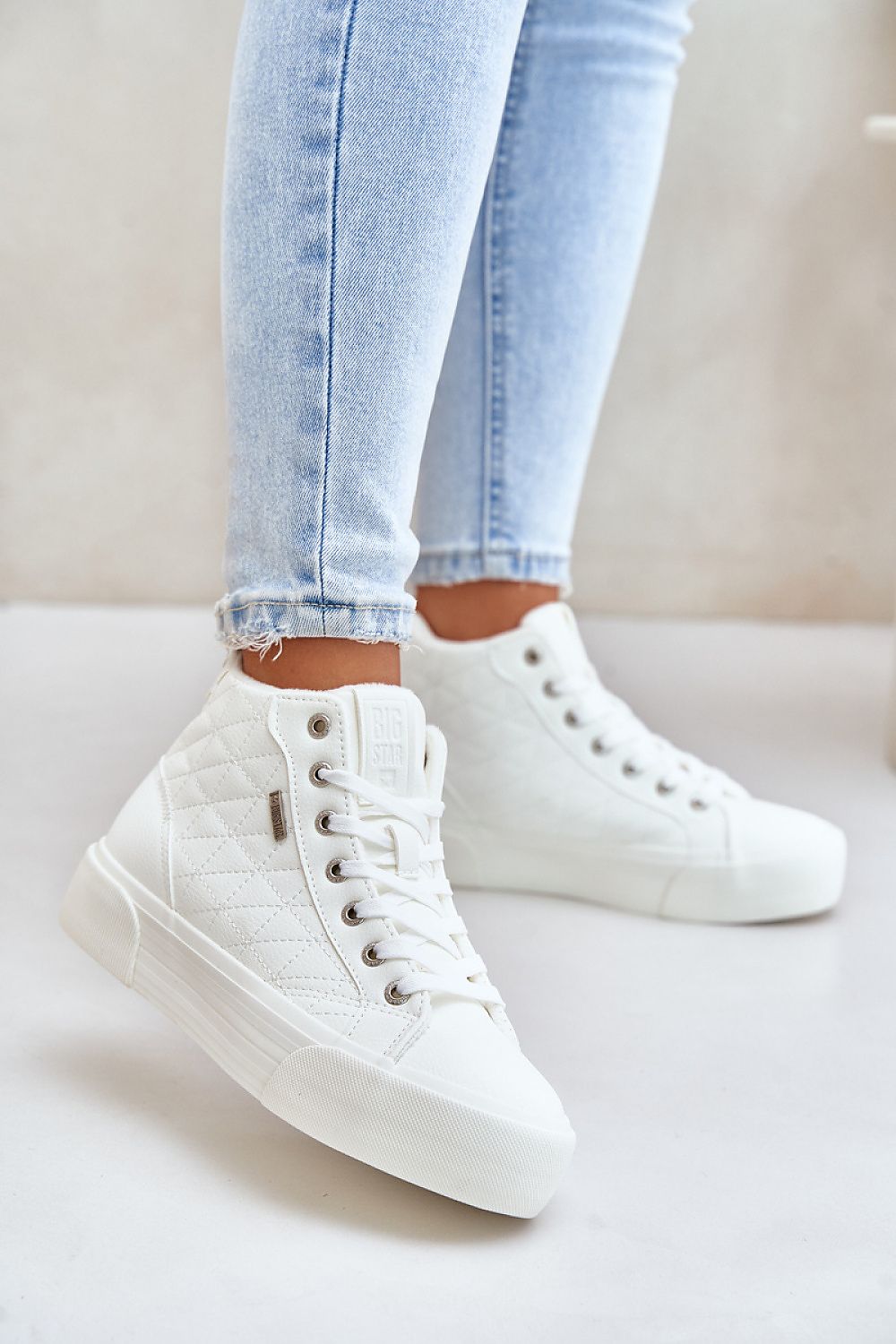 white lace sneakers front view