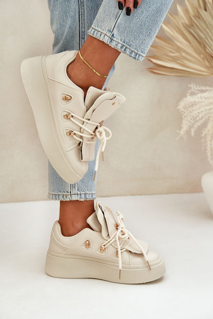 beige sport shoes detail view