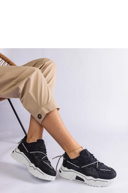 black lace sneakers detail view