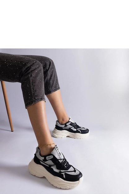 black lace sneakers detail view