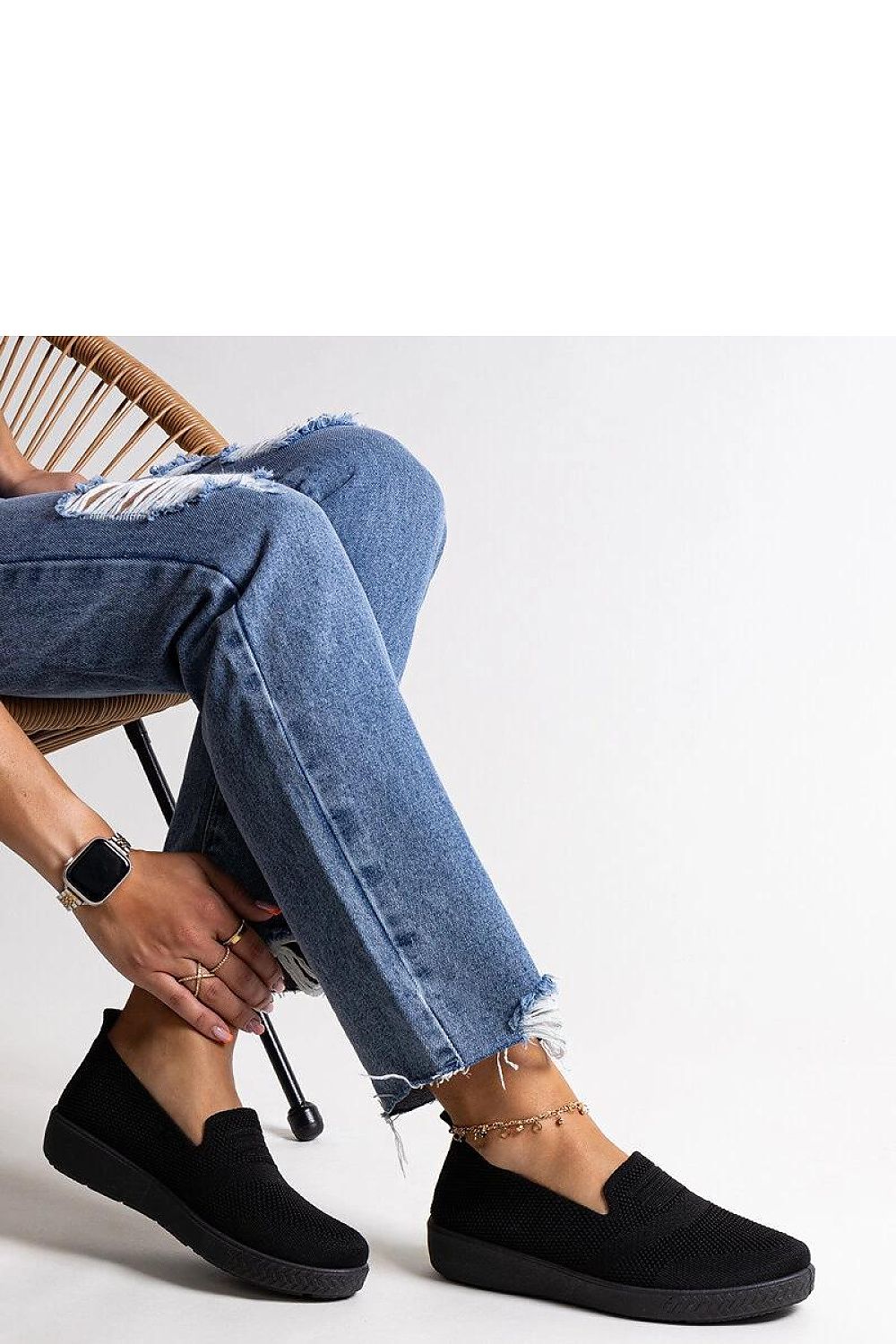 black sneakers front view