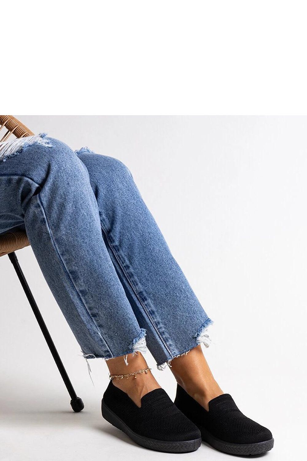 black sneakers alternate angle