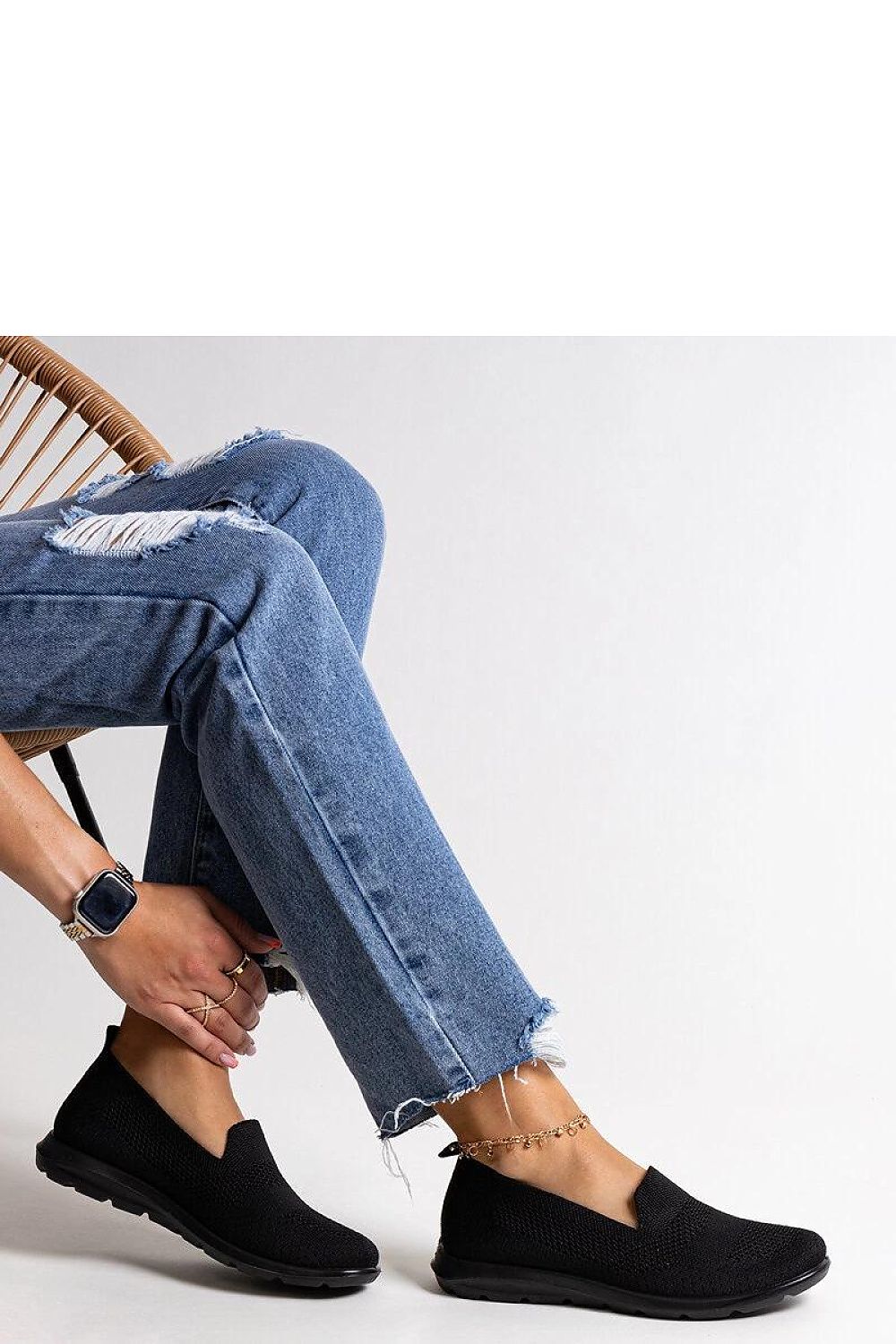 black sneakers front view