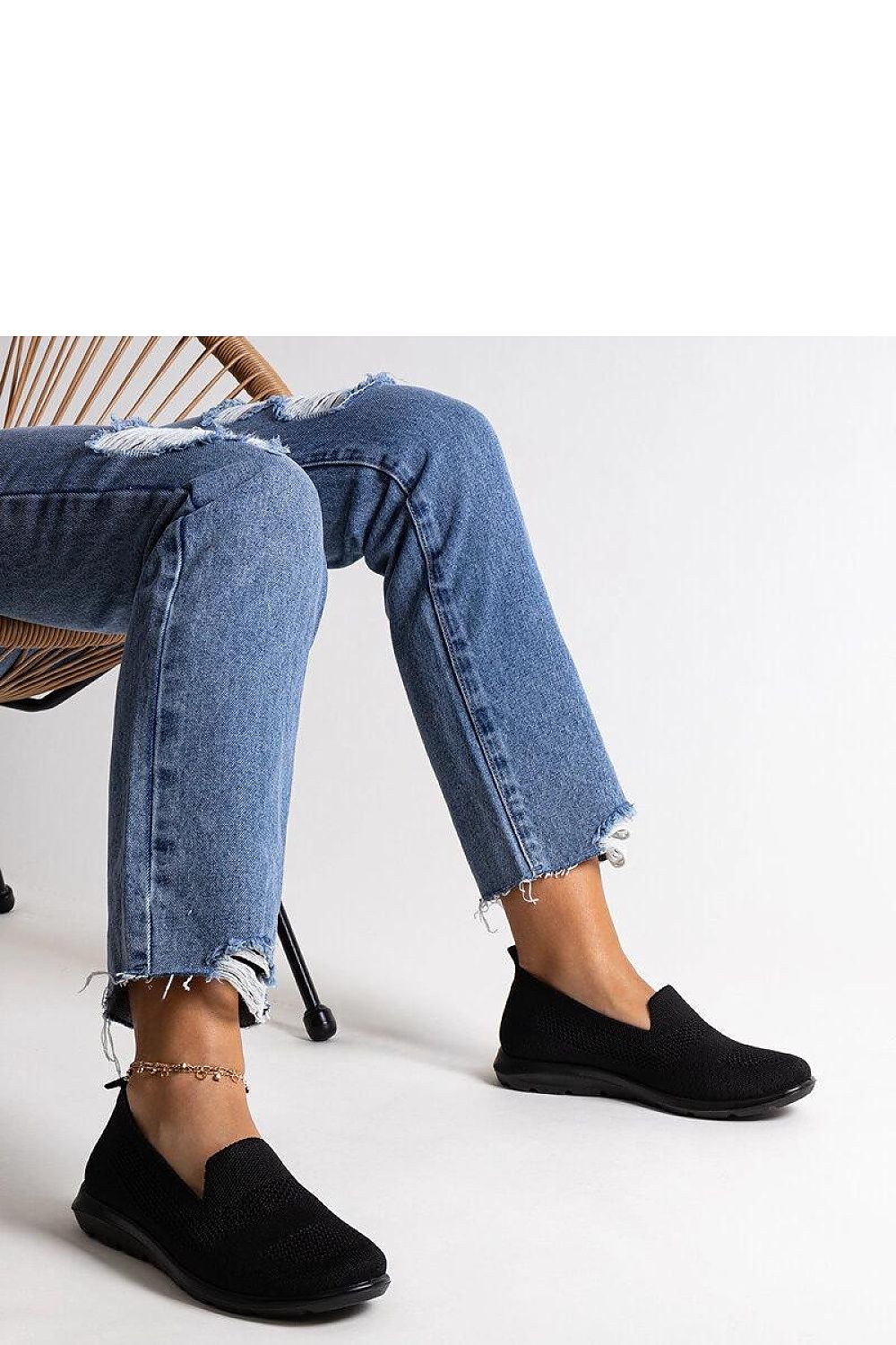 black sneakers alternate angle