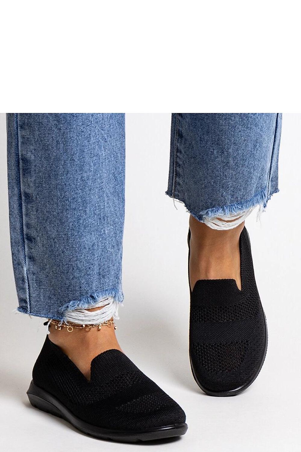 black sneakers back view