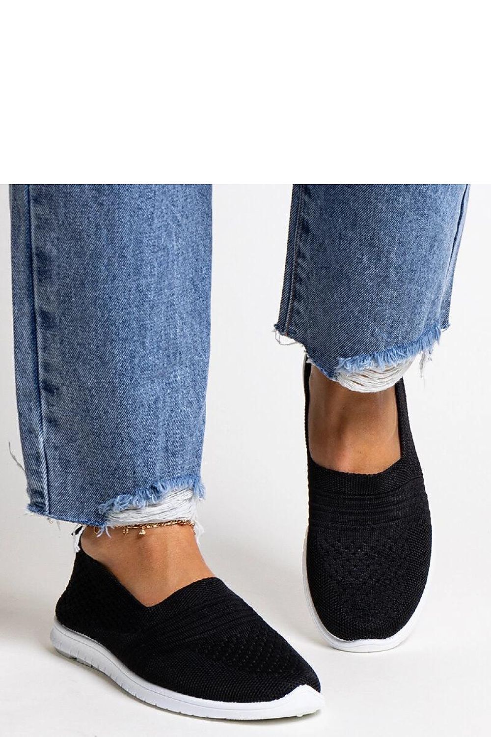 black sneakers back view