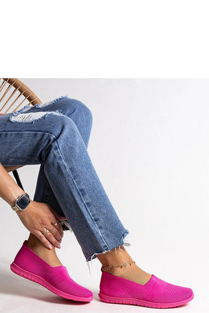 pink sneakers front view