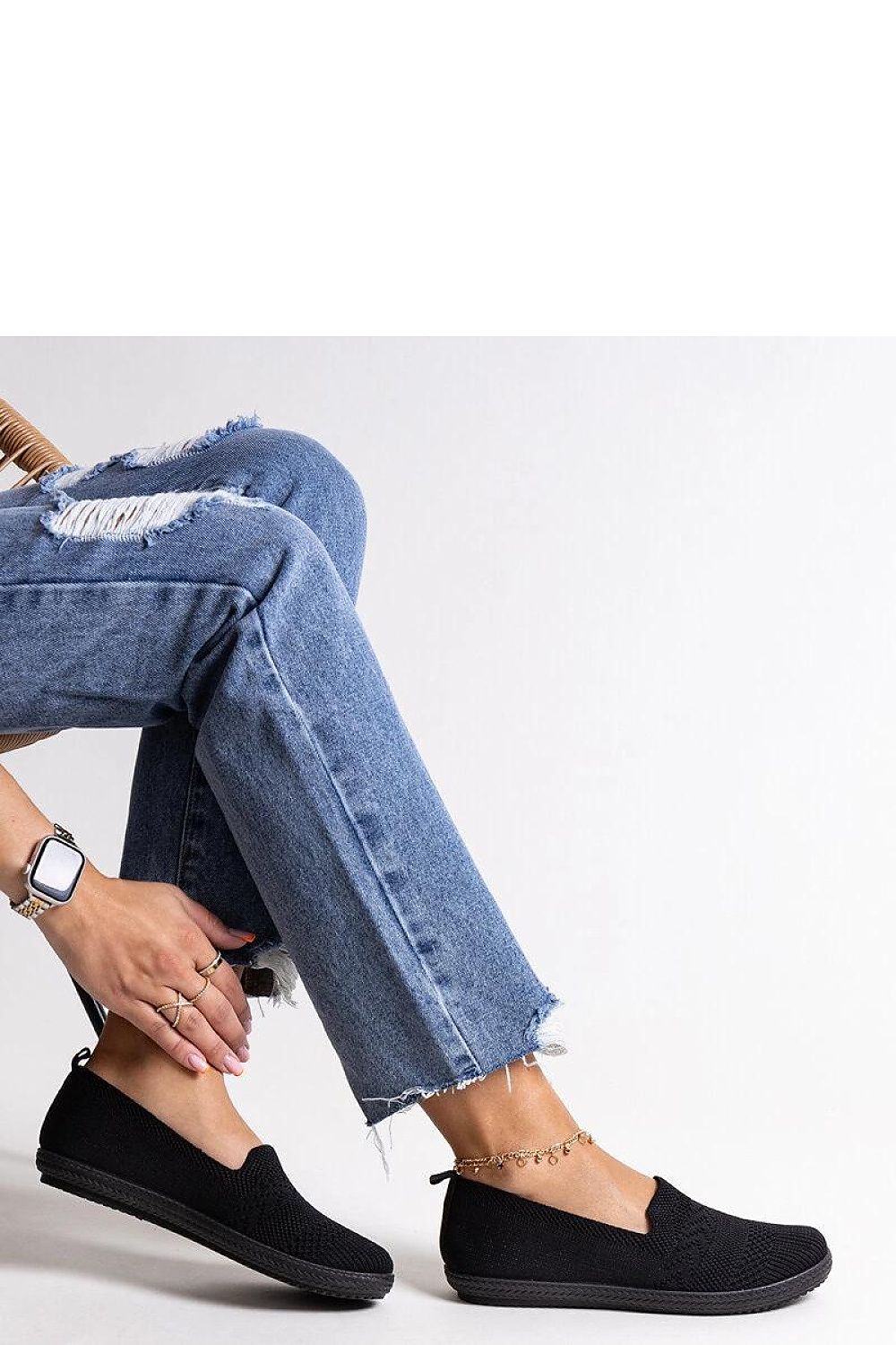 black sneakers alternate angle