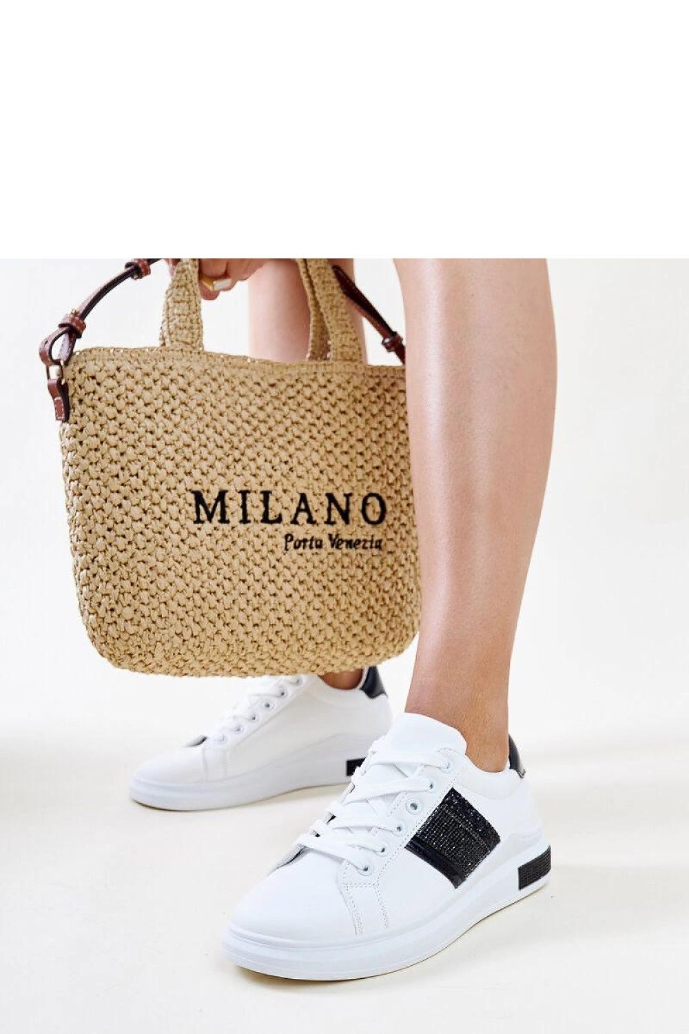 white lace sport shoes detail view