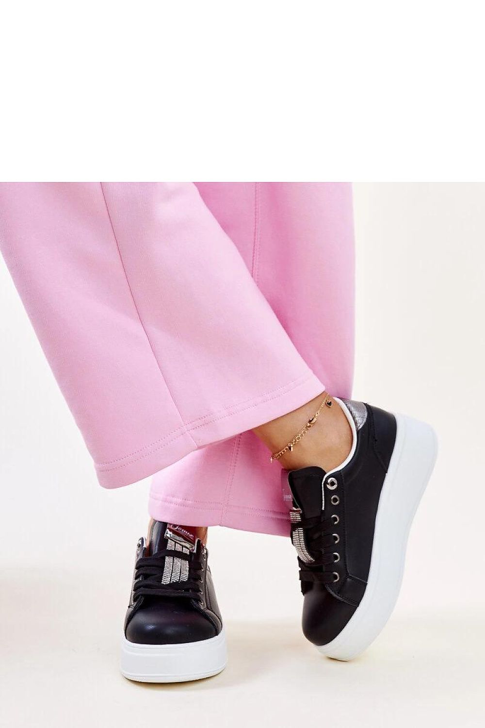 black lace sport shoes detail view