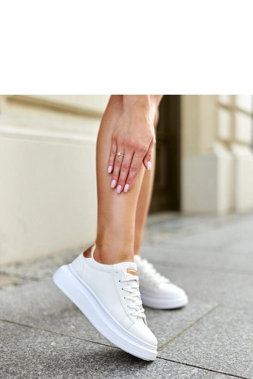 white lace sneakers detail view