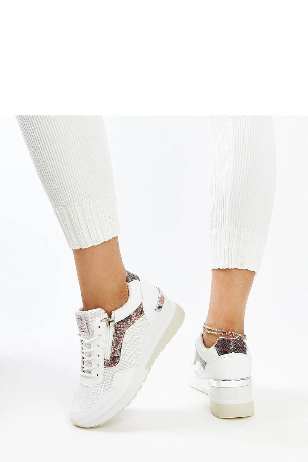 white sneakers back view